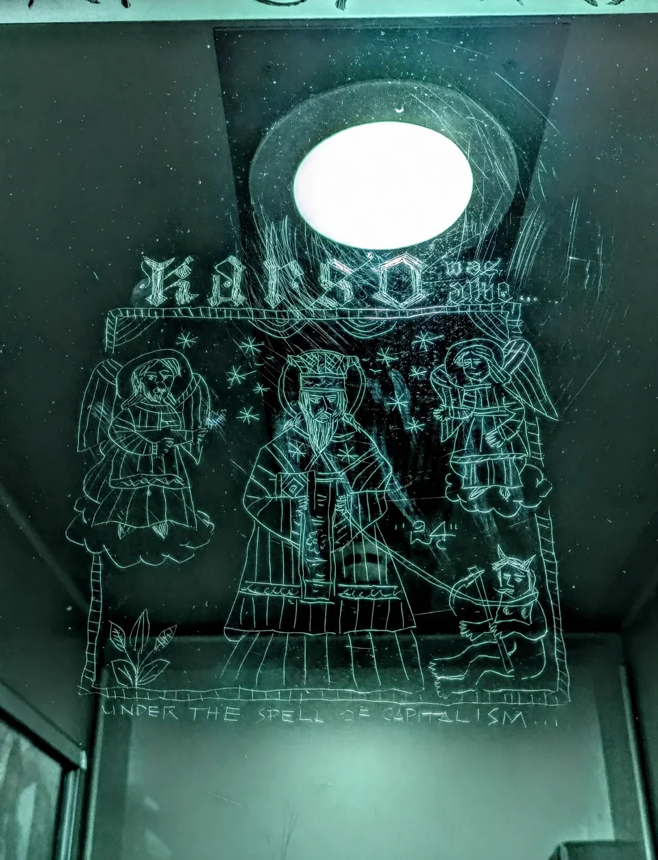 Medieval figures etched into glass